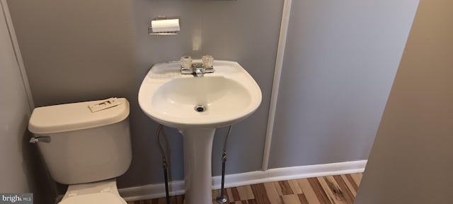 221 Boyd Ave, Winchester, VA 22601 - bathroom with toilet, wood finished floors, and a sink