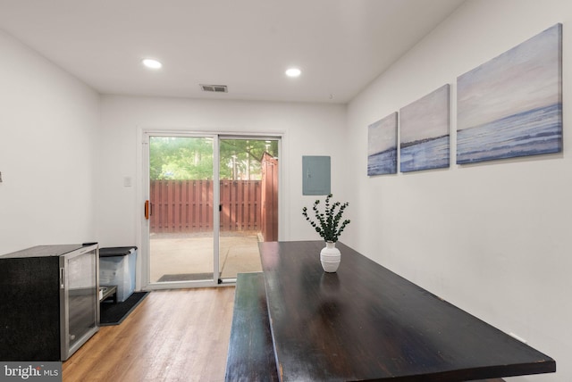 10627 Summer Oak Ct, Burke, VA 22015 - dining area featuring wood finished floors, electric panel, and recessed lighting