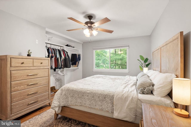10627 Summer Oak Ct, Burke, VA 22015 - bedroom with wood finished floors, a closet, and ceiling fan