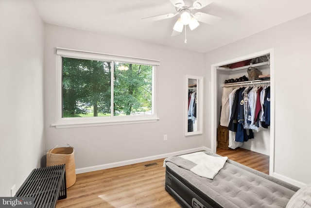 10627 Summer Oak Ct, Burke, VA 22015 - bedroom with wood finished floors, a closet, and a ceiling fan