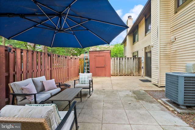 10627 Summer Oak Ct, Burke, VA 22015 - fenced backyard featuring a patio, outdoor lounge area, and a storage shed