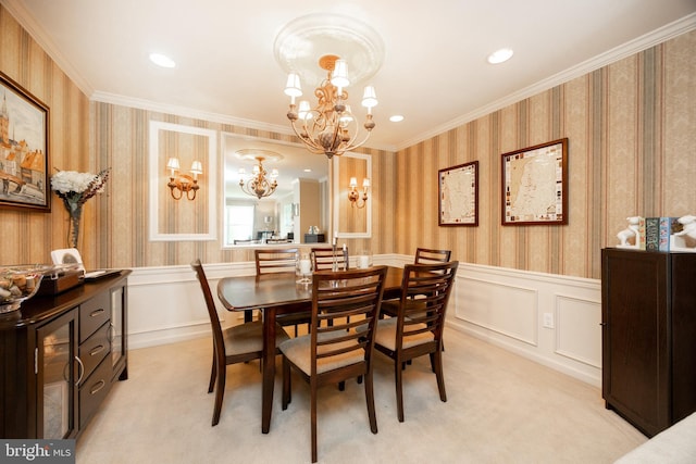 32 Granite Ln Unit 8, Chester Springs, PA 19425 - dining room with light colored carpet, a chandelier, wainscoting, crown molding, and wallpapered walls