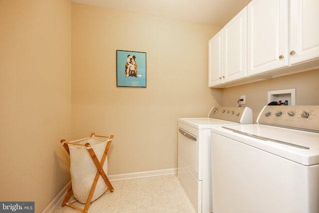 32 Granite Ln Unit 8, Chester Springs, PA 19425 - laundry area featuring washing machine and dryer, cabinet space, and baseboards
