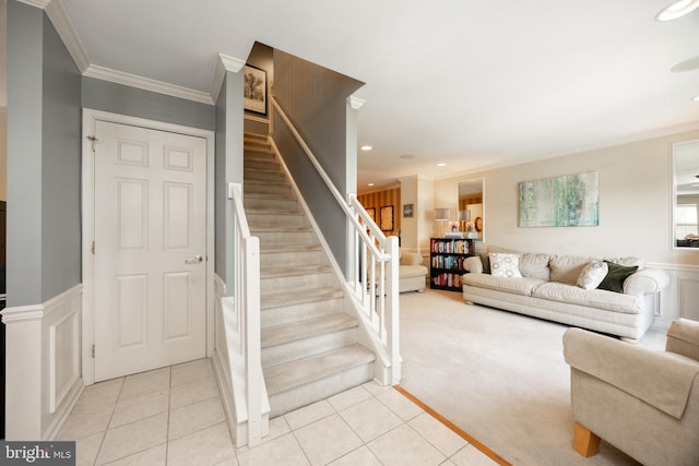 32 Granite Ln Unit 8, Chester Springs, PA 19425 - living room with crown molding, light tile patterned floors, stairs, recessed lighting, and a wainscoted wall