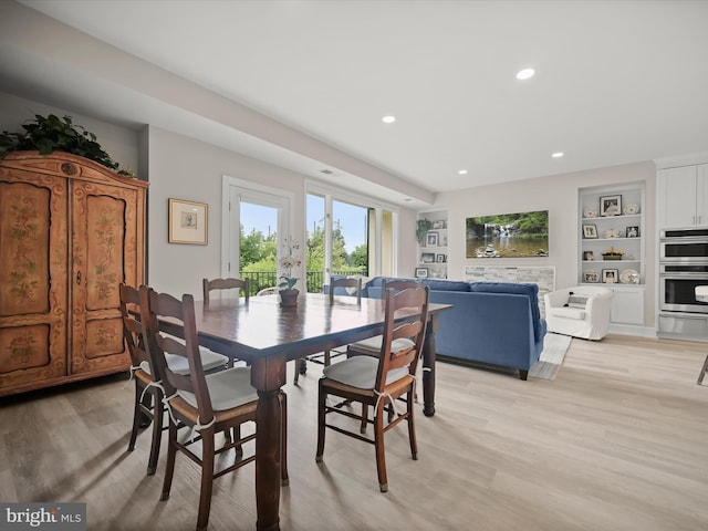 8101 Connecticut Ave Unit S 608, Chevy Chase, MD 20815 - dining room featuring light wood-type flooring, recessed lighting, and built in shelves
