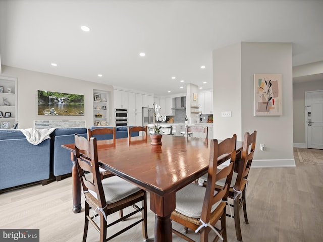 8101 Connecticut Ave Unit S 608, Chevy Chase, MD 20815 - dining room featuring recessed lighting, light wood-style floors, and baseboards