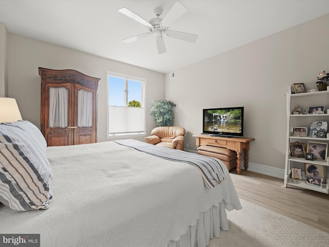 8101 Connecticut Ave Unit S 608, Chevy Chase, MD 20815 - bedroom featuring wood finished floors, baseboards, and ceiling fan