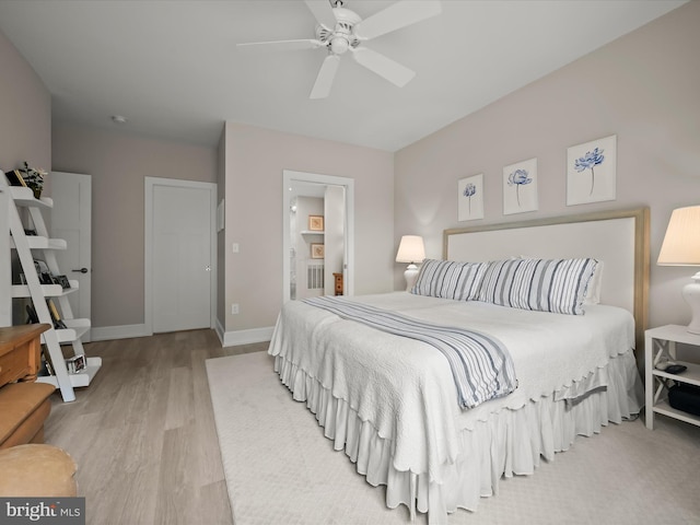 8101 Connecticut Ave Unit S 608, Chevy Chase, MD 20815 - bedroom with light wood-style flooring, baseboards, and ceiling fan