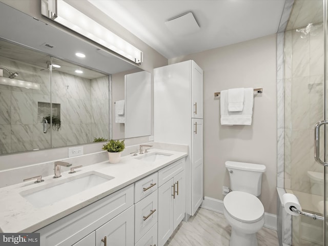 8101 Connecticut Ave Unit S 608, Chevy Chase, MD 20815 - bathroom featuring double vanity, a marble finish shower, toilet, and baseboards