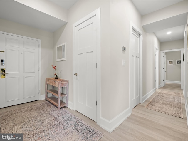 8101 Connecticut Ave Unit S 608, Chevy Chase, MD 20815 - foyer entrance with light wood-type flooring and baseboards