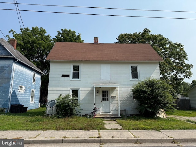 607 E Chestnut St, Delmar, MD 21875 - colonial-style house with a chimney