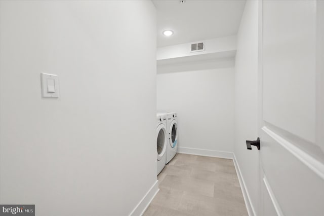 122 E Sharpnack St, Philadelphia, PA 19119 - washroom featuring washing machine and dryer and recessed lighting