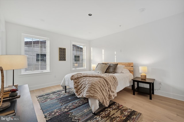 122 E Sharpnack St, Philadelphia, PA 19119 - bedroom featuring light wood finished floors and multiple windows