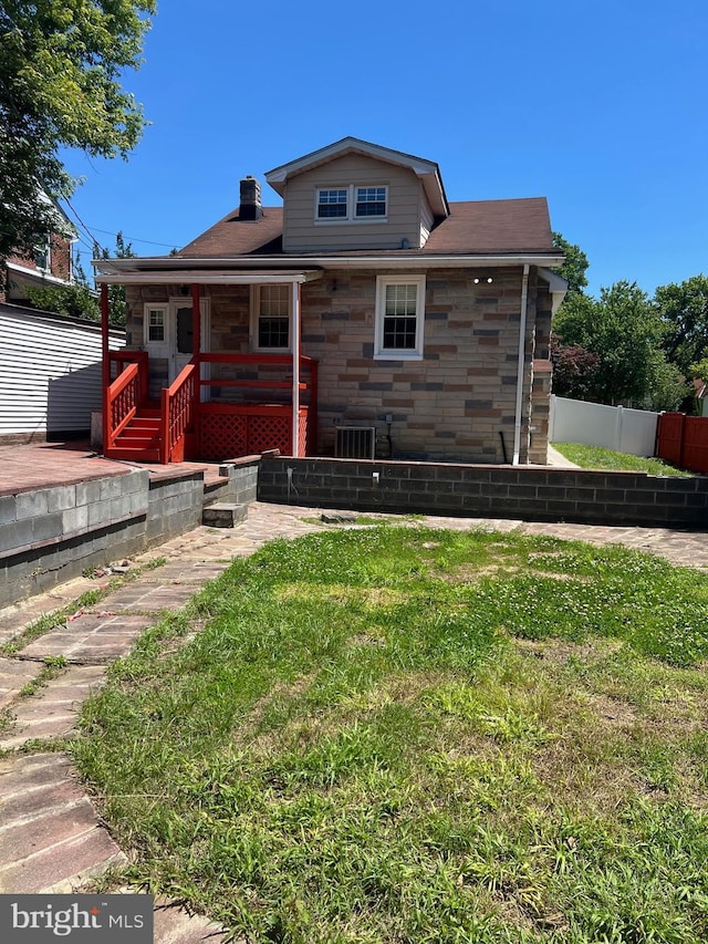 818 Warwick Rd, Baltimore, MD 21229 - back of house featuring stone siding