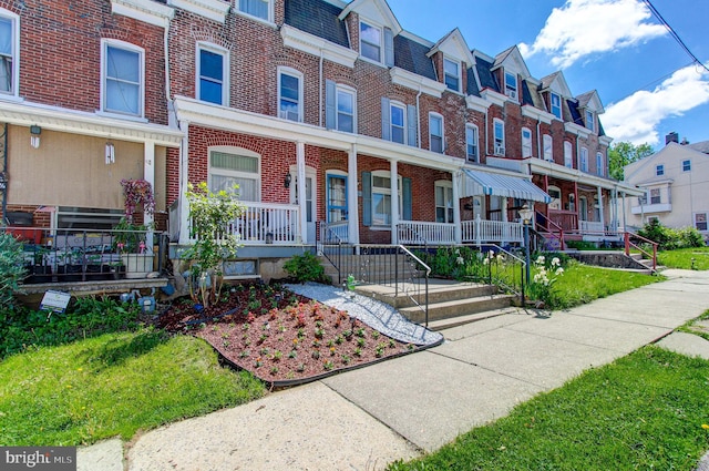 6051/2 N 16th St, Allentown, PA 18102 - view of property with covered porch, brick siding, and a residential view