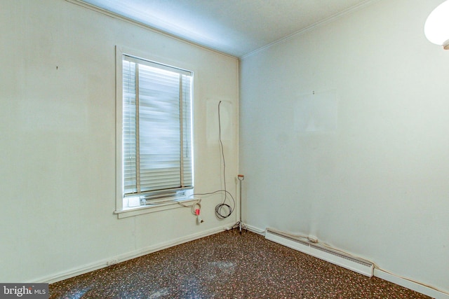 6051/2 N 16th St, Allentown, PA 18102 - unfurnished room with baseboard heating, baseboards, ornamental molding, and light speckled floor