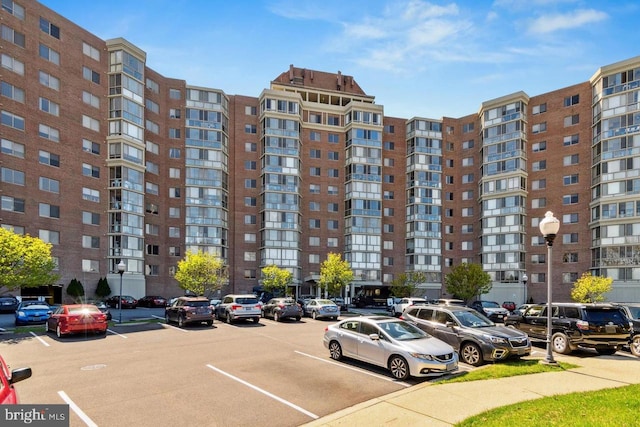 3200 N Leisure World Blvd Unit 218, Silver Spring, MD 20906 - view of apartment building / complex featuring uncovered parking