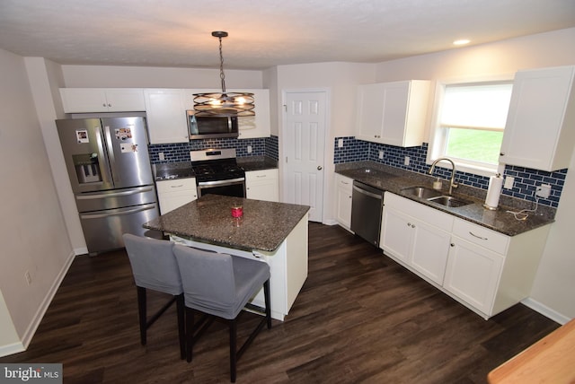 119 Shady Hollow Dr, Pleasant Gap, PA 16823 - kitchen with stainless steel appliances, a sink, white cabinets, and dark wood finished floors