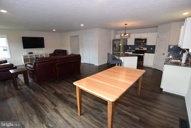 119 Shady Hollow Dr, Pleasant Gap, PA 16823 - dining area with dark wood-style floors, baseboards, and recessed lighting