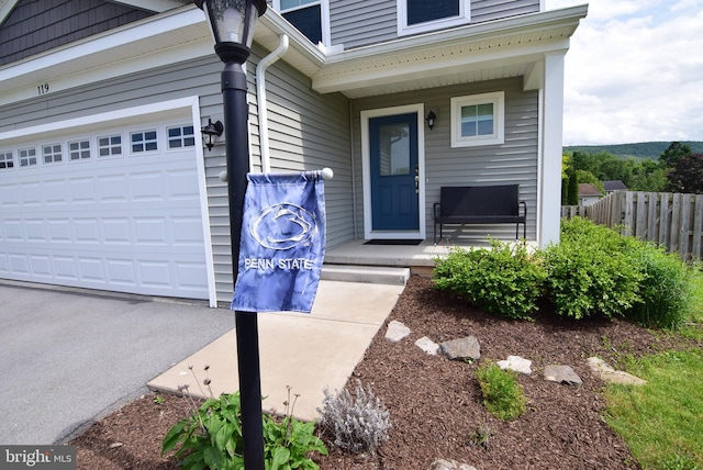 119 Shady Hollow Dr, Pleasant Gap, PA 16823 - property entrance with a garage and a porch