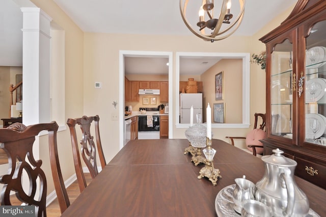 11188 Rienzi Pl Unit 204, Manassas, VA 20109 - dining area with a chandelier and stairway