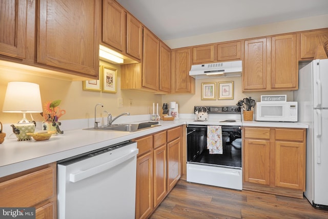 11188 Rienzi Pl Unit 204, Manassas, VA 20109 - kitchen with white appliances, under cabinet range hood, and light countertops