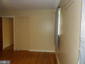 612 S Thomas St, Bedford, PA 15522 - hallway featuring wood finished floors and baseboards