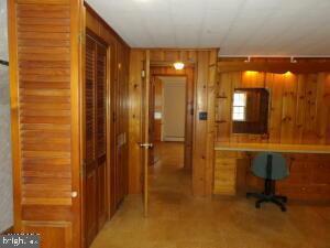 612 S Thomas St, Bedford, PA 15522 - unfurnished office featuring wooden walls