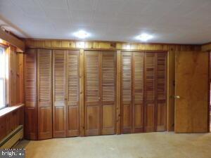 612 S Thomas St, Bedford, PA 15522 - closet featuring a baseboard heating unit