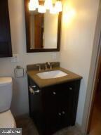 612 S Thomas St, Bedford, PA 15522 - bathroom featuring vanity and toilet