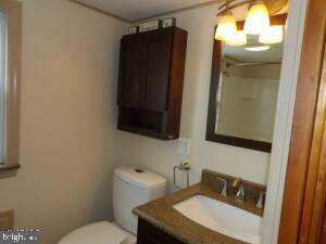 612 S Thomas St, Bedford, PA 15522 - bathroom featuring toilet and vanity