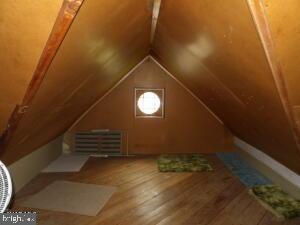 612 S Thomas St, Bedford, PA 15522 - additional living space featuring vaulted ceiling and wood finished floors
