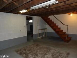 612 S Thomas St, Bedford, PA 15522 - below grade area featuring stairs