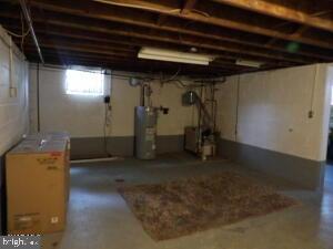 612 S Thomas St, Bedford, PA 15522 - below grade area with water heater