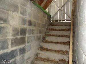 612 S Thomas St, Bedford, PA 15522 - stairway featuring concrete block wall