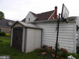 612 S Thomas St, Bedford, PA 15522 - view of home's exterior with a yard