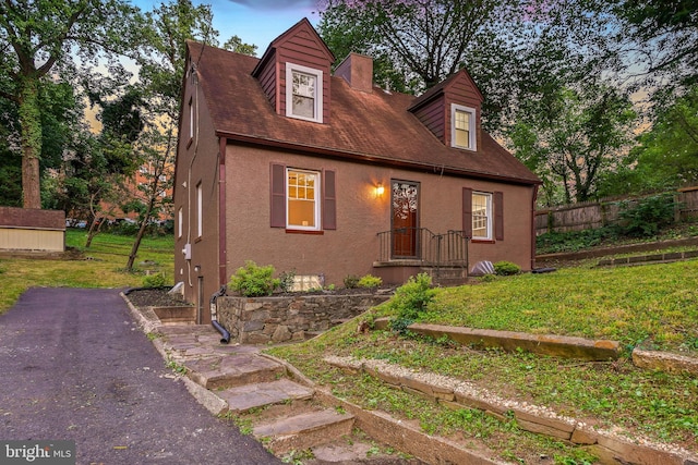 514 Silver Spring Ave, Silver Spring, MD 20910 - cape cod-style house with stucco siding and an outdoor structure