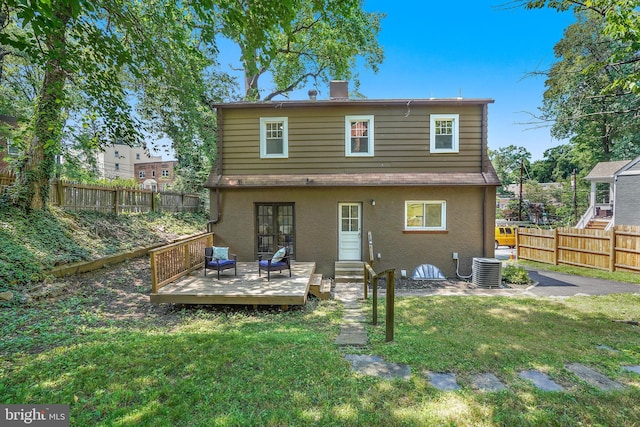 514 Silver Spring Ave, Silver Spring, MD 20910 - back of house featuring a wooden deck, stucco siding, entry steps, and cooling unit