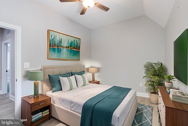 5002 Chalgrove Ave, Baltimore, MD 21215 - bedroom featuring light wood-style flooring, lofted ceiling, baseboards, and ceiling fan
