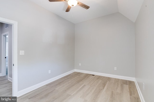 5002 Chalgrove Ave, Baltimore, MD 21215 - empty room featuring ceiling fan, light wood-style floors, vaulted ceiling, and baseboards