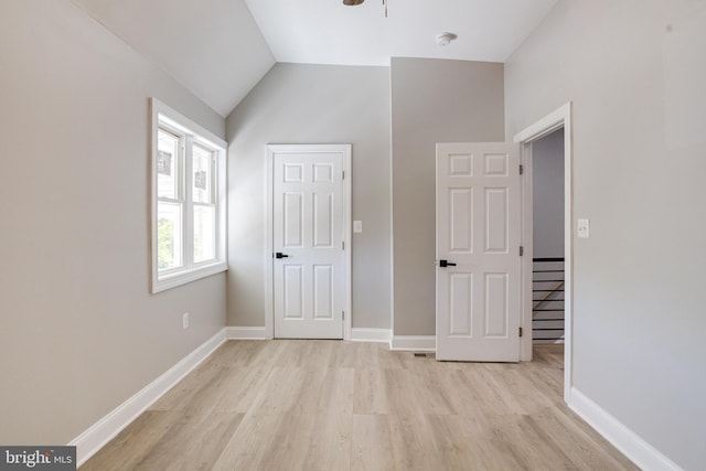 5002 Chalgrove Ave, Baltimore, MD 21215 - unfurnished bedroom with light wood finished floors, baseboards, and lofted ceiling