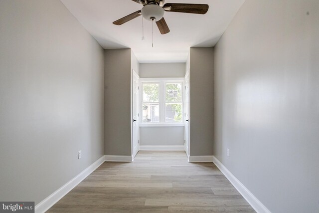 5002 Chalgrove Ave, Baltimore, MD 21215 - spare room featuring a ceiling fan, light wood-style floors, and baseboards