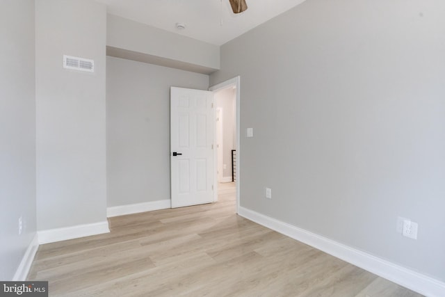 5002 Chalgrove Ave, Baltimore, MD 21215 - empty room featuring light wood finished floors, baseboards, and ceiling fan