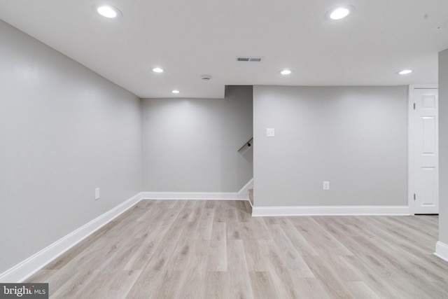 5002 Chalgrove Ave, Baltimore, MD 21215 - finished basement with recessed lighting, light wood-type flooring, baseboards, and stairway