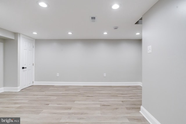 5002 Chalgrove Ave, Baltimore, MD 21215 - unfurnished room with recessed lighting, light wood finished floors, and baseboards