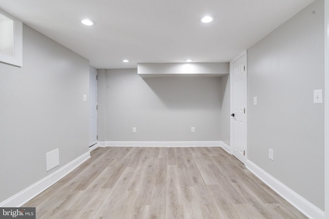 5002 Chalgrove Ave, Baltimore, MD 21215 - finished below grade area featuring recessed lighting, light wood finished floors, and baseboards