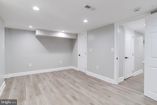 5002 Chalgrove Ave, Baltimore, MD 21215 - finished basement featuring light wood finished floors, baseboards, and recessed lighting
