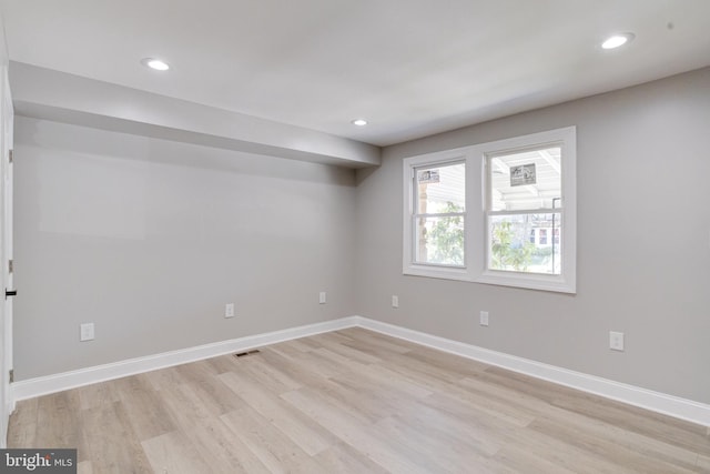 5002 Chalgrove Ave, Baltimore, MD 21215 - unfurnished room featuring light wood-style flooring, baseboards, and recessed lighting