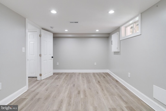 5002 Chalgrove Ave, Baltimore, MD 21215 - below grade area with light wood finished floors, recessed lighting, and baseboards