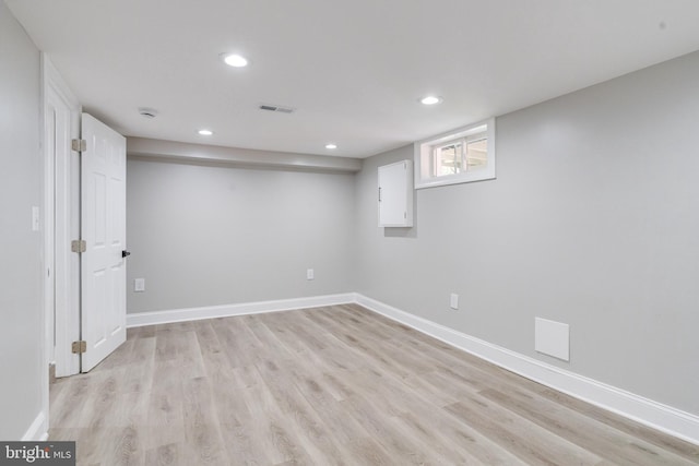5002 Chalgrove Ave, Baltimore, MD 21215 - below grade area with light wood-type flooring, recessed lighting, and baseboards